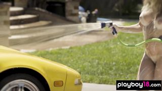 Bubble covered ebony MILF Misty Stone and her nude teen GFs washing a car