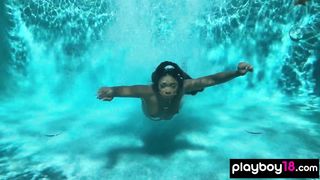 Naked ebony MILF Ana Foxxx fingering her hairy black pussy under the water