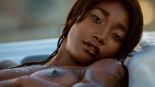 Bombastic ebony teen Mimi Desuka introduces her sweaty black pussy outdoor